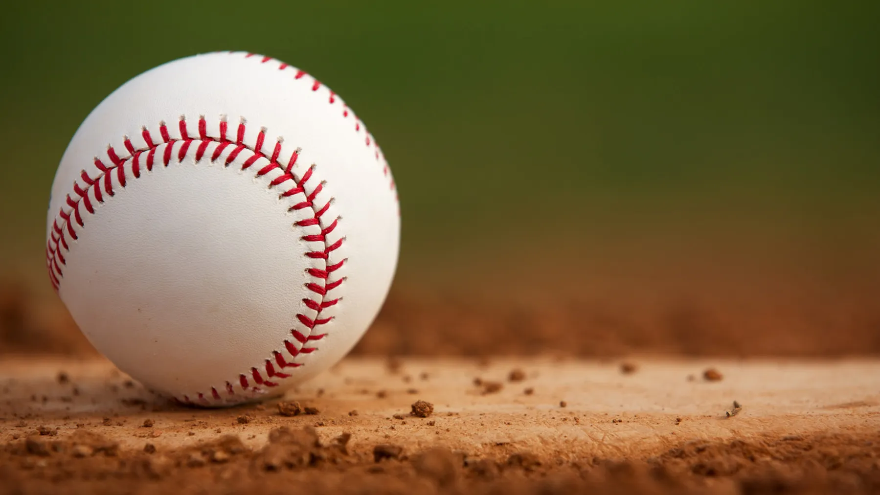 Baseball resting on a pitcher's mound